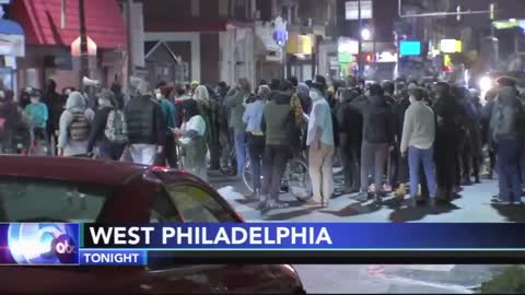 Mass of antifa black bloc. Philadelphia Riot shops looted.