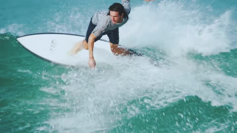 video male suffer riding skillfully the sea waves