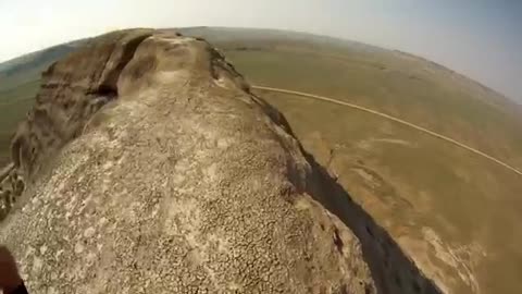 Daredevil Rides His Unicycle Over 200 Foot Cliff