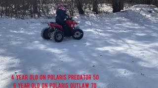 Kids riding 4 wheelers in snow