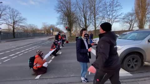 "Activists" block a road in Germany. Man freaks out because he has to go to work.