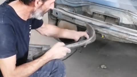 A mechanic's special way of using tools