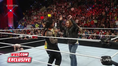 Roman_Reigns_celebrates_winning_the_WWE_World_Heavyw