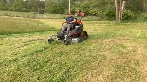 Altoz TRX766 mowing a field