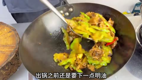 Make a home-cooked dish of bitter melon fried with pork slices.