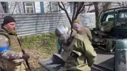 Ukraine - Unloading Russian POW's To Slaughter Them