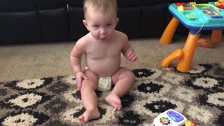 Adorable baby dances to music