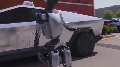 Tesla Robot Driving a Cybertruck for Uber