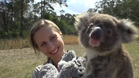 Keeper Hayley and May the koala joey