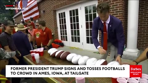 Trump's Crowd-Pleasing Gesture: Tossing Footballs to Iowa Supporters"