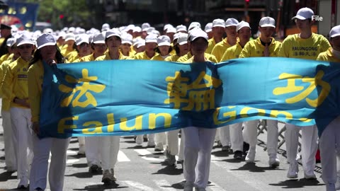 US accuses two of bribing IRS in anti-Falun Gong plot