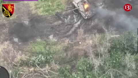 Burning Russian T-80 tank in the Ukrainian steppes