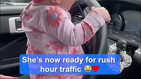 Funny baby having hilarious "road rage".
