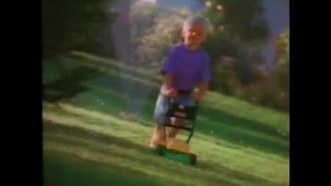 May 24, 1997 - A Little Boy and His Toy Lawn Mower