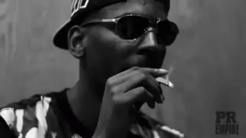 Young Dolph smoking