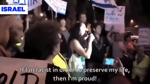 Footage shows an Israeli woman shouting in Hebrew that it's Israelis' right to be racist!