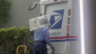 Mailperson Has A Makeshift Umbrella