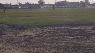 Intense Local Rugby Team Training: Tire Carrying Races for Ultimate Fitness!