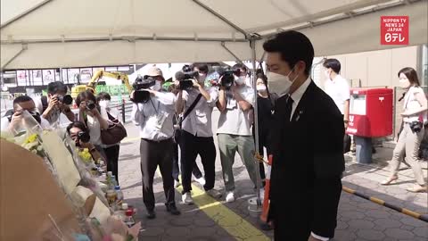 Upper house representative Sato Kei and others visit site of former PM fatal shooting