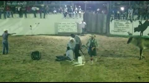 4 guys sitting in chairs get taking out by bull