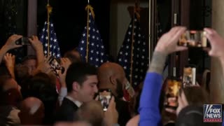 Trump is introduced as "the next President of the United States" as he enters the room at Mar-a-Lago