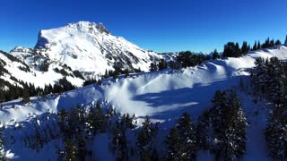 Drone captures breathtaking mountain snowboarding footage