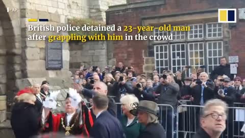 King Charles narrowly avoids being hit by eggs thrown at him during public meeting