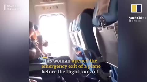 Woman opens emergency exit