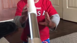 Baby Sticks Tongue in Vacuum Cleaner