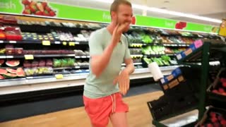 Dancing in busy supermarket