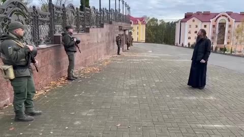 Ukrianian security armed with rifles and machine guns descends upon Banchen Monestary