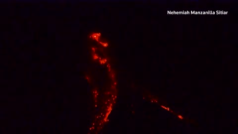 Philippines' Mayon volcano lights up the night