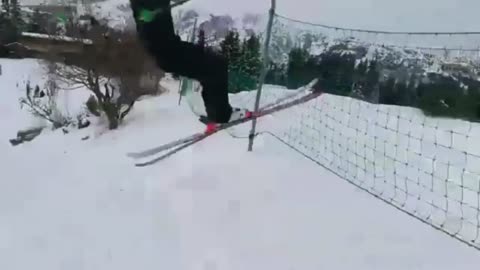 Guy Jumps Right Into A Net On His Skis