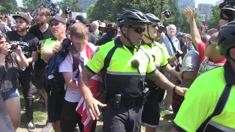 Aug 19 2017 Boston free speech rally 1.10 Police escort man out protecting against Antifa-leftist