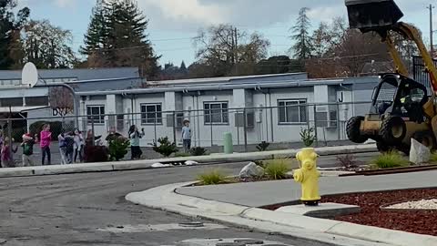 Construction Worker Shows Off for School Kids