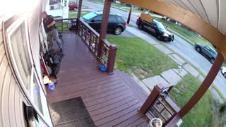 Sherriff Acting Strange on Front Porch Caught by Security Camera