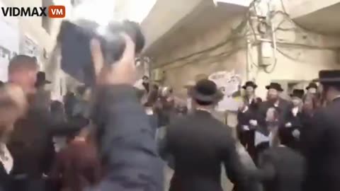 Neturei Karta Orthodox Jews Throw Stones At Isreali Security While Holding Palestinian Flags