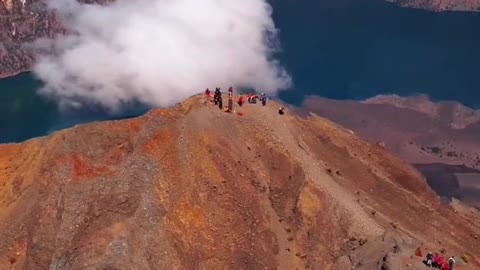 Arrive at the top of Mount Linjani Volcano, Longmu Island