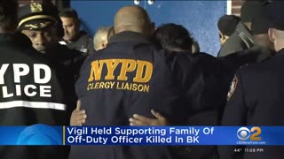 Vigil held supporting family of off-duty officer killed in Brooklyn