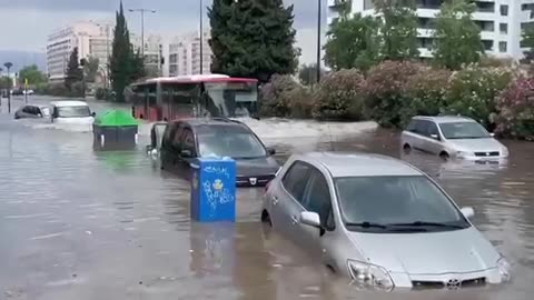 Bus goes through an extreme flood in Zaragoza, Spain