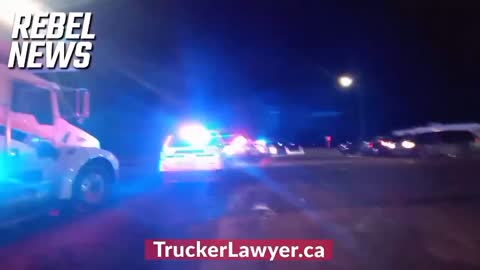 Police line in Milk River blocking supporters from joining the Coutts border blockaders