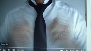 how put on a tie