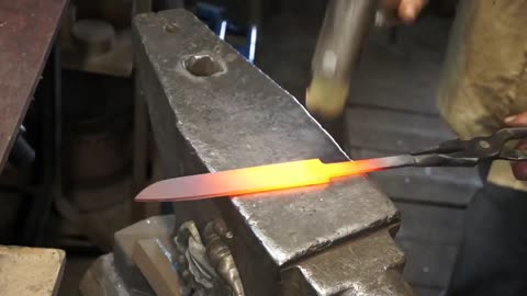 Damascus steel from two tape measures and 100 blades of stationery knives