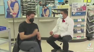 He shakes his hand and then puts on a mask. SCIENCE!