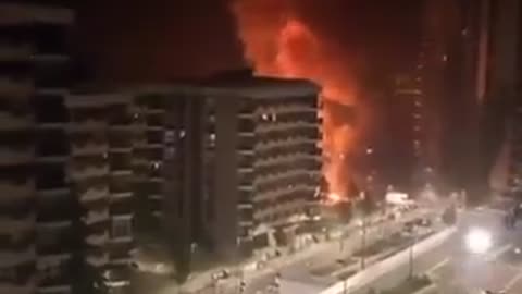 Residential buildings been set on fire by migrant rioters in suburbs of the capital of Paris