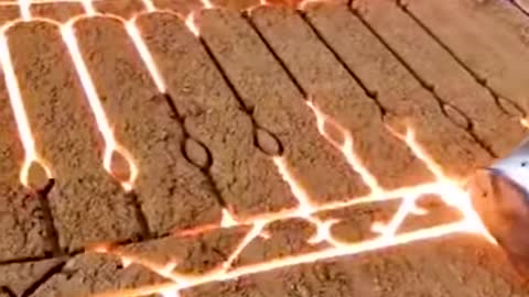 Pouring molten iron into molds to make fences