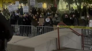 Far-left protesters chant outside a Charlie Kirk event at the University of New Mexico