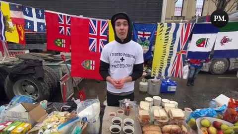 Supporters of the Freedom Convoy hand out free food to anyone who needs it