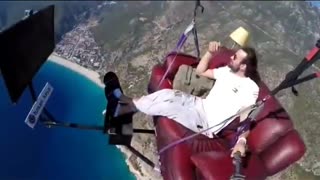 Man attempts to parachute with couch and it's very Terrifying 😪😪