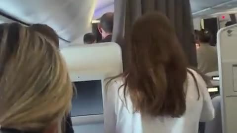 Israelis in an airplane as Hatikvah (Israel’s national anthem) plays